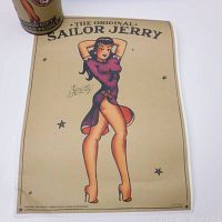 Front view of the Sailor Jerry limited edition poster featuring classic artwork of a woman in vintage attire with stars and text on beige background.