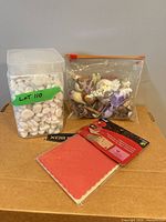 Overall lot with pebbles container, birds bag, card kit
