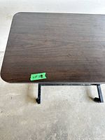 Top view of woodgrain laminate tabletop