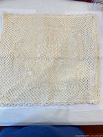 Full view of crocheted pillow cover front