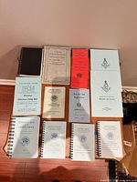 All thirteen Masonic publications laid out on table