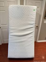 Front view of single/twin adjustable mattress standing upright