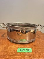 overall view of footed handled basket front