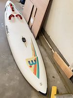 Full view of board top side with graphics and footstraps