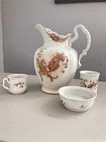 Full view of four porcelain pieces