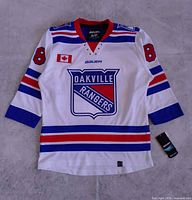 Front view of Bauer Oakville Rangers youth jersey showing logo, number 88 on sleeve, tags attached