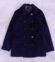 Front view of navy double-breasted peacoat