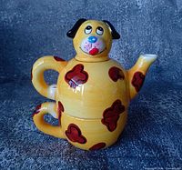 Assembled novelty dog teapot set stacked