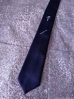 Full view of navy silk necktie