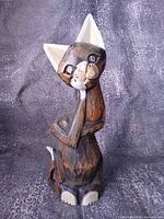 Full view of carved wooden cat sculpture