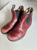 Front three-quarter view of both boots showing overall style and color