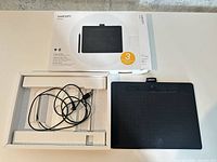 Tablet, cable and box overview