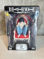 Front of sealed box showing figure and branding