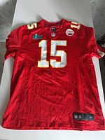 Full front view of red Patrick Mahomes #15 Chiefs jersey with patches