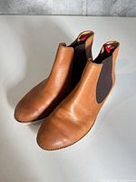 Full view of both boots from front side