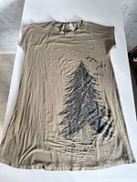 Front view of khaki long T-shirt displaying tree and birds graphic