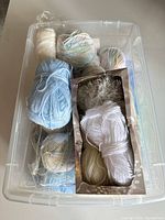 Top view showing all yarn skeins and storage bin