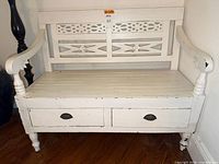 Front view of bench showing drawers and cutout backrest
