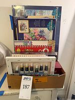 Boxed lot showing paint-by-number kits, acrylic paint kit and other supplies