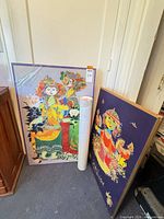 Two mounted posters and tube with loose prints