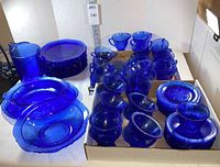Wide view of entire lot showing plates, bowls, pitcher and quantity