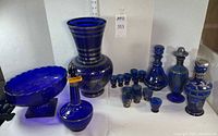 Group shot of all cobalt blue glassware items