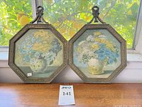Front view of both framed floral prints