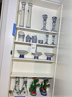 Cabinet view with all porcelain items displayed