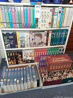 Overall view of three shelves filled with VHS sets including Pride and Prejudice, Forsyte Saga, Upstairs Downstairs, assorted others