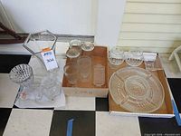 Entire lot overview showing all glass pieces in boxes