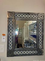 Front view showing entire punched tin mirror with Talavera tiles