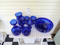 Full set showing large bowl, dessert cups and small bowls