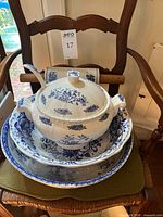 tureen with lid and ladle nested in wash basins
