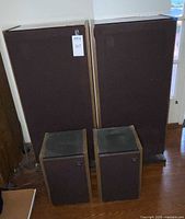 Front view two floorstanding and two bookshelf JBL speakers
