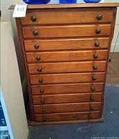Front view showing full cabinet and all 12 drawers