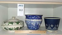 Three ceramic pieces: Wedgwood Ivy tureen, blue scenic planter, Soholm blue planter with ruler for scale