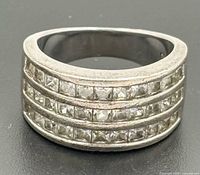 front view showing three rows of square cubic zirconia on wide band