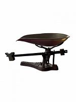 Full profile of cast iron balance scale with tray