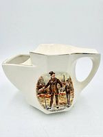Front view showing transferware scene and overall shape