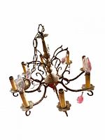 Top view of six-arm chandelier showing prisms and canopy