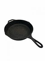Top view of cast iron skillet showing interior cooking surface and handle