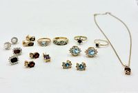 Full layout showing rings, earrings and necklace