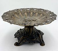 Oblique view showing bowl, rim, and pedestal