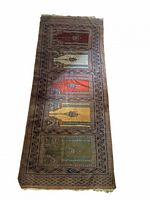 Full view of prayer rug showing five colored niches and full border with fringe