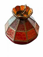Overall view of stained glass lamp showing red and orange panels
