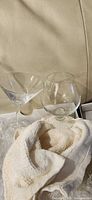Martini glass and brandy snifter side by side