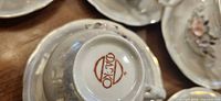 Underside of cup showing "Dako" mark