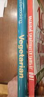 Spines of both hardcover cookbooks