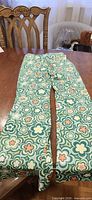 Full view of green floral swim skort front