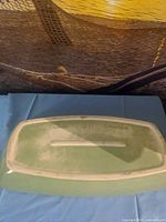 Underside showing green glaze, foot rim, and molded mark 'BEAUCEWARE 551 CANADA'